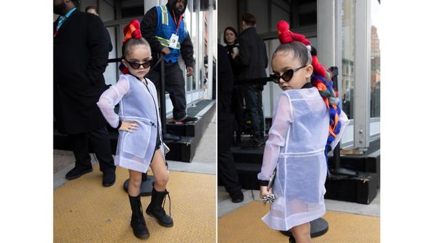 Instagram influencer Taylen Biggs poses for photos outside of a show during Fashion Week. Associated Press photographer Mark Lennihan captured some of the sidewalk action as the frenetic week of fashion shows wound down. (Mark Lennihan / AP)