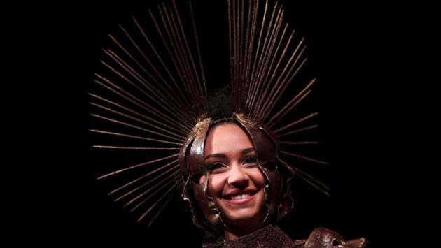 A model displays a design made of chocolate in a fashion show during an annual chocolate festival in Brussels, Thursday, Feb. 13, 2020. (AP Photo/Francisco Seco) (AP)