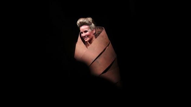 A model displays a creation made of chocolate in a fashion show during an annual chocolate festival in Brussels, Thursday, Feb. 13, 2020. (AP Photo/Francisco Seco) (AP)