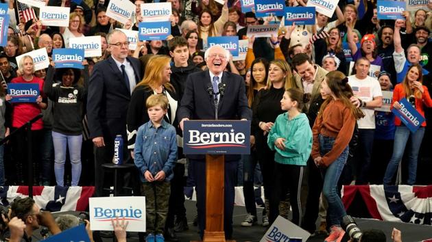 Democratic US presidential candidate Senator Bernie Sanders is accompanied by his wife Jane O’Meara Sanders and other relatives as he arrives to speak at his New Hampshire primary night rally in Manchester, US. (Rick Wilking / REUTERS)