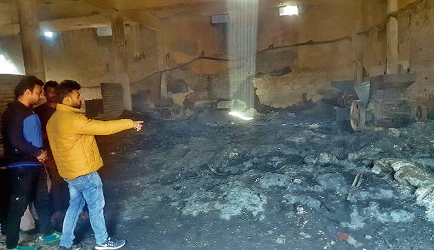 The rubble after the fire at the plastic granule factory in Jugiana village on Friday. (HT PHOTO) The rubble after the fire at the plastic granule factory in Jugiana village on Friday. (HT PHOTO)