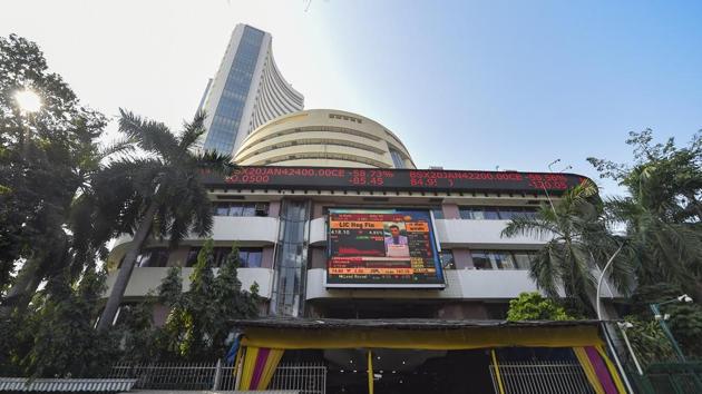 A view of the stock prices displayed on a digital screen outside BSE building in Mumbai. (PTI) A view of the stock prices displayed on a digital screen outside BSE building in Mumbai. (PTI)