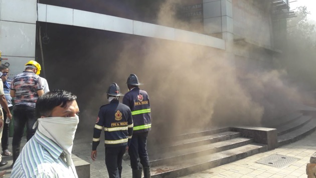 Firefighters atThane’s Lake City Mall. (Praful Gangurde/HT Photo) Firefighters atThane’s Lake City Mall. (Praful Gangurde/HT Photo)