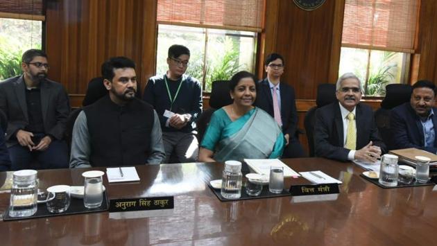 Finance Minister Nirmala Sitharaman, RBI Governor Shaktikanta Das and MoS Finance Anurag Thakur at a meeting with RBI’s Central Board of Directors in New Delhi on Saturday.(SONU MEHTA/HT PHOTO.)