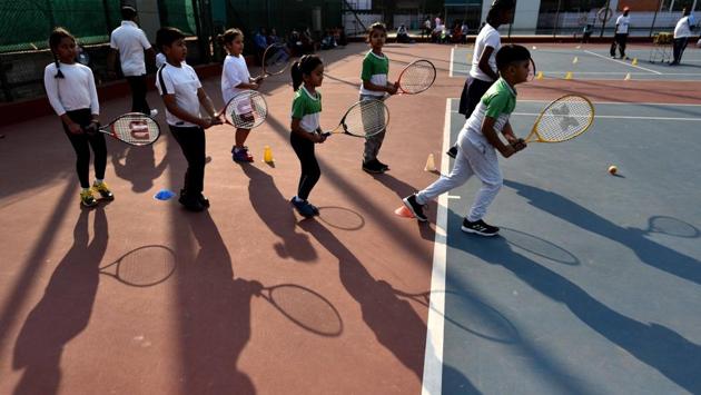 Children are seen training inside the Calcutta South Club on the eve of centenary celebrations.“The South Club is as much a heritage institution as the Eden Gardens. Places of pilgrimage,” says Raju Mukherji, the former Bengal and East Zone cricket captain and author of ‘Eden Gardens Legend and Romance.’ “South Club members were affluent people who back in the day would be called the gin-and-tonic brigade,” he says. (Samir Jana / HT Photo)