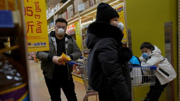 Customers wearing face masks shop inside a supermarket, as the country is hit by an outbreak of the novel coronavirus, in Beijing, China. (REUTERS) Customers wearing face masks shop inside a supermarket, as the country is hit by an outbreak of the novel coronavirus, in Beijing, China. (REUTERS)