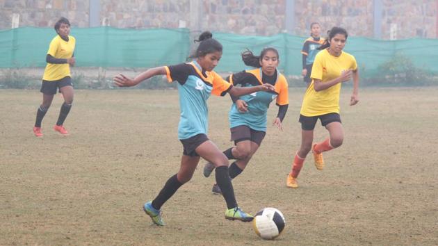 Players seen in action at the Football Academy, in Baliawas village, Gurugram, India(Yogendra Kumar/HT PHOTO)