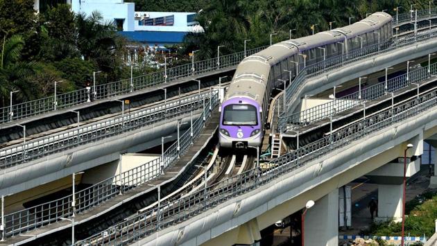 A train of the East-West metro line is seen during a test run from Sector V to Salt Lake Stadium, in Kolkata. Railway Minister Piyush Goyal flagged off the first phase of the East-West corridor of the Kolkata Metro, giving the city its second metro line on Thursday, 36 years after the country’s first underground connectivity system came into being in the city. (Samir Jana / HT Photo)