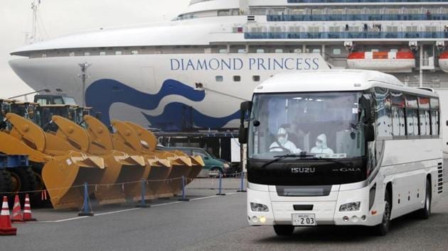 A driver wearing protective suits is seen inside a bus which believed to carry elderly passengers of the cruise ship Diamond Princess, where dozens of passengers were tested positive for coronavirus. (REUTERS) A driver wearing protective suits is seen inside a bus which believed to carry elderly passengers of the cruise ship Diamond Princess, where dozens of passengers were tested positive for coronavirus. (REUTERS)