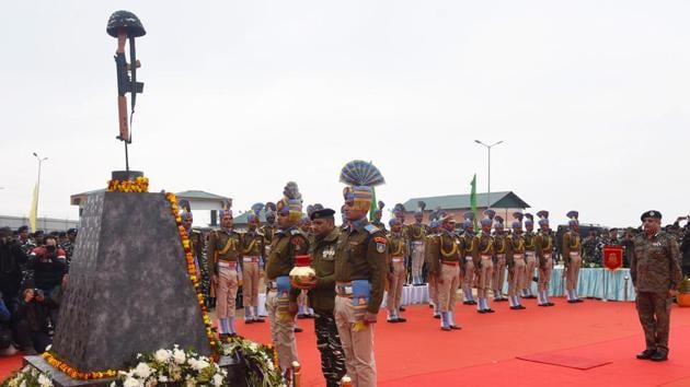 CRPF personnel pay tribute at a memorial to the 40 CRPF jawans killed in the Pulwama terror attack in February last year, at Lethpora, South Kashmir. “Tributes to the brave martyrs who lost their lives in the gruesome Pulwama attack last year. They were exceptional individuals who devoted their lives to serving and protecting our nation. India will never forget their martyrdom,” PM Modi wrote in a Twitter post. (Waseem Andrabi / HT Photo)