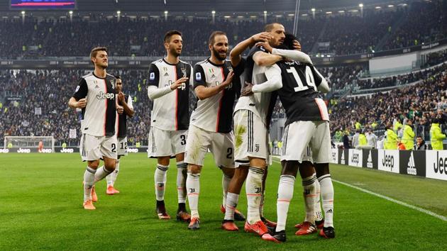Juventus' Juan Cuadrado celebrates scoring their second goal with teammates.(REUTERS)