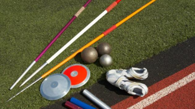 Javelins, discuses, relay batons, shots and sports shoes beside track (Getty Images) Javelins, discuses, relay batons, shots and sports shoes beside track (Getty Images)