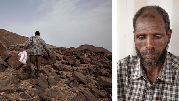 Mohammed Eissa on the side of a highway, near Lac Assal. Nearby were two dozen graves, piles of rocks, with no headstones. People said they belong to migrants who like Eissa embarked on an epic journey from Ethiopia through the Horn of Africa countries Djibouti or Somalia, then across the sea and through the war-torn country of Yemen. (Nariman El-Mofty / AP)