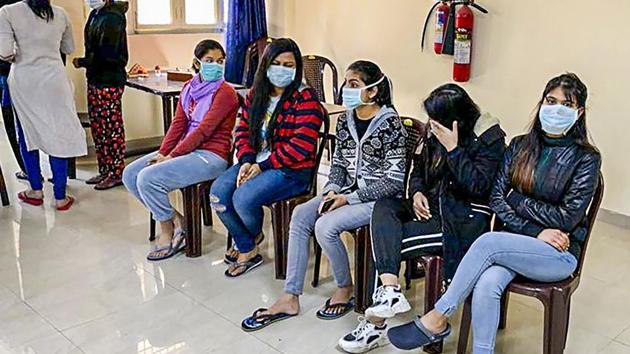 Wuhan evacuees at the ITBP's quarantine facility at Chhawla in New Delhi, on Sunday. (PTI Photo) Wuhan evacuees at the ITBP's quarantine facility at Chhawla in New Delhi, on Sunday. (PTI Photo)
