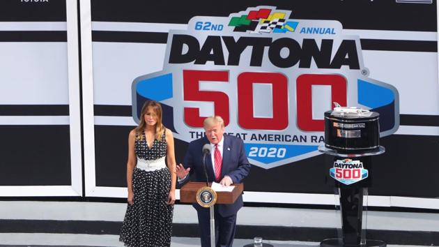 President Donald Trump gives a speech alongside wife Melania Trump in Victory Lane prior to the Daytona 500 at Daytona International Speedway. (USA TODAY Sports via Reuters) President Donald Trump gives a speech alongside wife Melania Trump in Victory Lane prior to the Daytona 500 at Daytona International Speedway. (USA TODAY Sports via Reuters)