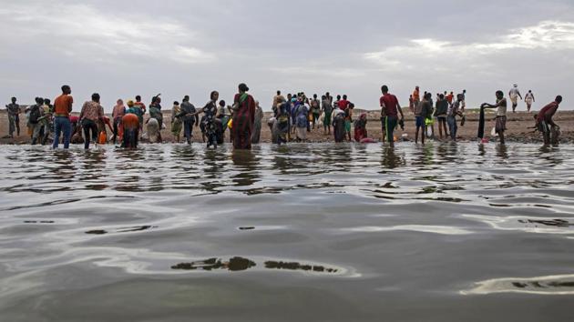 Flailing in the water, they formed human chains to help the women and children onto shore. Ibrahim collapsed on the sand and passed out. A security official in Lahj province said bodies of dead migrants or groups in hiding are often found. “Where would we take them and what would we do with them?” he asked, speaking on condition of anonymity. (Nariman El-Mofty / AP)
