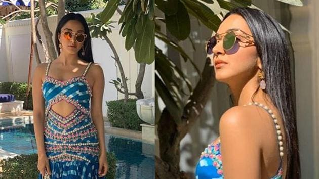 We’re a tad confused about the blue checkered dress Kiara chose to wore - is it beachwear fashion or something else? (Viral Bhayani/Instagram) We’re a tad confused about the blue checkered dress Kiara chose to wore - is it beachwear fashion or something else? (Viral Bhayani/Instagram)