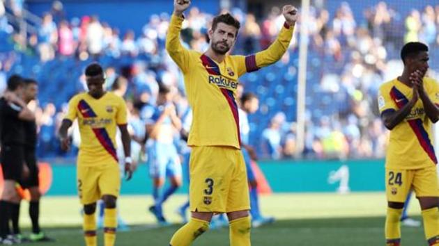Barcelona's Gerard Pique celebrates after a match. (REUTERS) Barcelona's Gerard Pique celebrates after a match. (REUTERS)