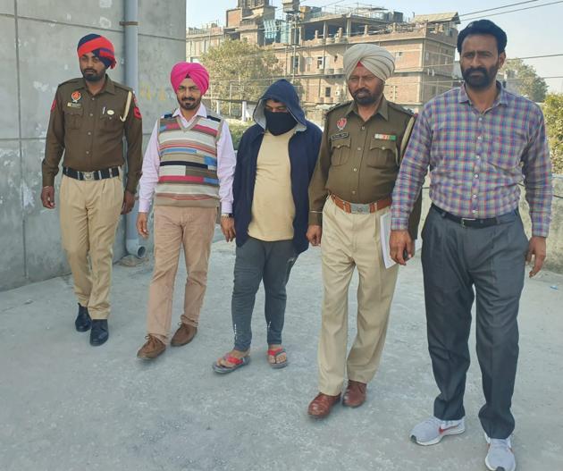 The accused in police custody in Ludhiana on Tuesday. (HT PHOTO) The accused in police custody in Ludhiana on Tuesday. (HT PHOTO)