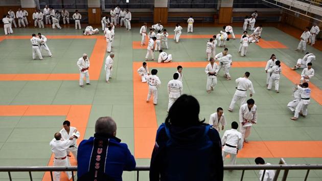 People from Russia watch the judo Winter Training. Coach Sameshima admitted there was a language barrier but stressed that judo was “a genuinely physical activity” that transcends language. “Even if they don’t know the language, they throw and they are thrown. We feel pain, of course, when we are thrown, but we can get a connection with each other by doing so,” he said. (Behrouz Mehri / AFP) People from Russia watch the judo Winter Training. Coach Sameshima admitted there was a language barrier but stressed that judo was “a genuinely physical activity” that transcends language. “Even if they don’t know the language, they throw and they are thrown. We feel pain, of course, when we are thrown, but we can get a connection with each other by doing so,” he said. (Behrouz Mehri / AFP)