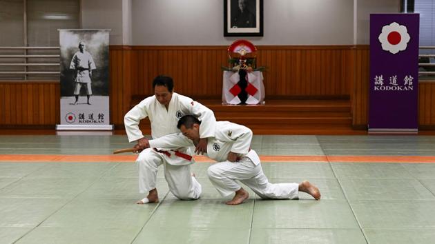 Judo masters demonstrate techniques in front of a picture of judo's founder Jigoro Kano, during the Winter Training. On the day AFP visited, there were at least a dozen foreign judoka grappling at the Kodokan, from Australia, the United States, Germany, France, Britain and Brazil. Over the 10-day Kangeiko, 50 had registered from 16 countries. (Behrouz Mehri / AFP) Judo masters demonstrate techniques in front of a picture of judo's founder Jigoro Kano, during the Winter Training. On the day AFP visited, there were at least a dozen foreign judoka grappling at the Kodokan, from Australia, the United States, Germany, France, Britain and Brazil. Over the 10-day Kangeiko, 50 had registered from 16 countries. (Behrouz Mehri / AFP)