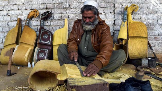 After the US invasion of 2001 toppled the Taliban, militancy erupted across the border in Pakistan also. A Pakistani Taliban formed and took control of the country’s tribal areas and swathes of Khyber Pakhtunkhwa. “The extremists were killing artists and singers in the society to create fear,” explained singer Gulzar Alam, who was attacked three separate times and later left Pakistan, fearing for his life. (Abdul Majeed / AFP)