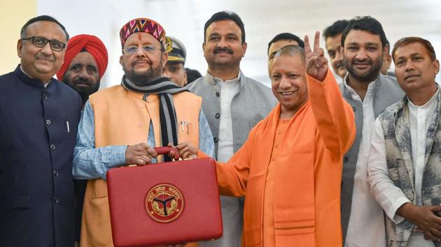 Uttar Pradesh Chief Minister Yogi Adityanath (right) and Finance Minister Suresh Khanna before the presentation of state budget in the UP legislative assembly, in Lucknow on Tuesday.(PTI Photo)