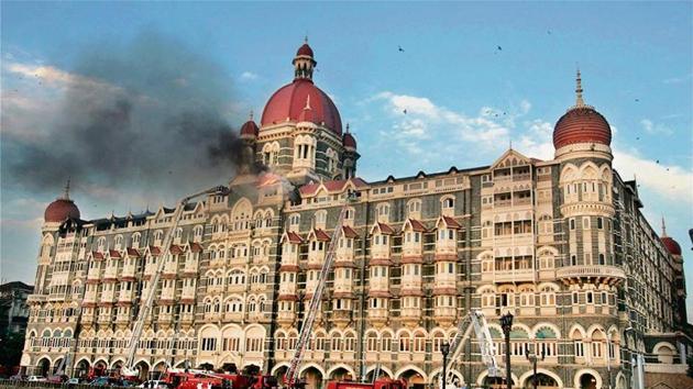 Firemen douse the fire at the top floor of the Hotel Taj after a terrorist attack in Mumbai in November, 2008.