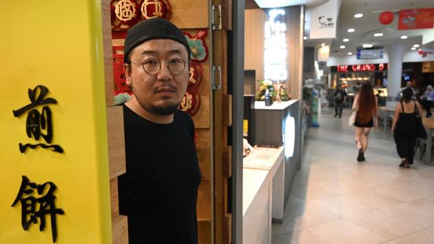 A ban on travellers from China has hit many neighbourhoods particularly hard. In Australia, the travel ban has been compounded by almost 100,000 Chinese students being unable to fly Down Under to start the academic year. “Our main customers are from China... (so) it’s very difficult,” said Su Yin, whose pancake store sits downstairs from a Melbourne college with a large Chinese student base. (William West / AFP)