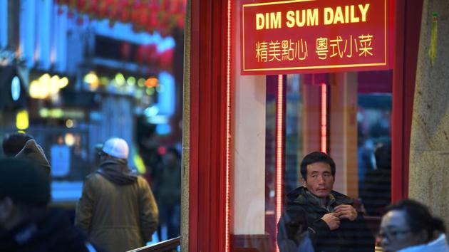 In London, David Tang said he had clearly noticed others avoiding him in recent weeks, but understood why people were afraid and had tried to take it in his stride. “I travel by train every morning. One day last week, all the people were standing, and I’ve got an empty seat next to me,” he said. “I laughed about it.” (Daniel Leal-Olivas / AFP)