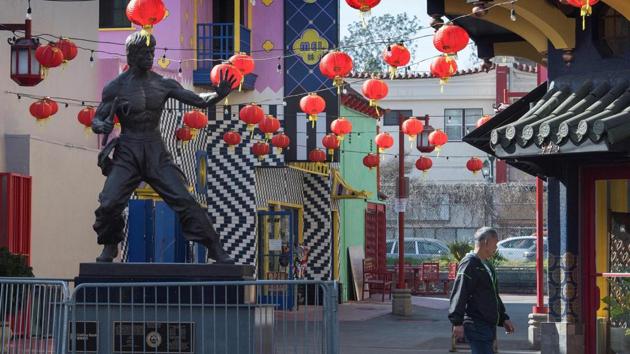 A man walks past the deserted Los Angeles Chinatown in California. “It’s unfair that a lot of people are scared of Chinese people,” said Eddie Lau, president of Melbourne’s Chinese Chamber of Commerce. “We tell people, ‘we are fine, don’t be scared.’” (Mark Ralston / AFP)