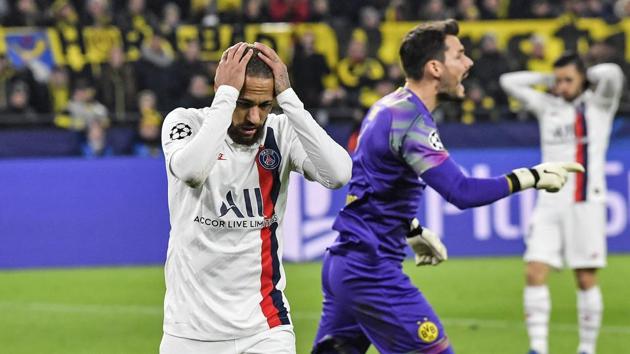 PSG's Neymar reacts disappointed beside Dortmund's goalkeeper Roman Buerki (AP) PSG's Neymar reacts disappointed beside Dortmund's goalkeeper Roman Buerki (AP)