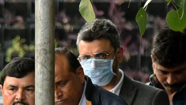 Sanjeev Chawla is seen in police custody after he was extradited from London and brought to New Delhi for his involvement in a match-fixing racket. (Amal KS/HT PHOTO) Sanjeev Chawla is seen in police custody after he was extradited from London and brought to New Delhi for his involvement in a match-fixing racket. (Amal KS/HT PHOTO)