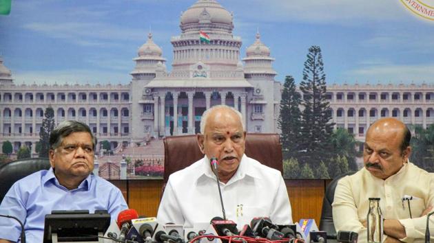 Karnataka Chief Minister B. S. Yediyurappa (C) along with minsiters Jagadish Shettar (L) and Basavaraj Bommai addresses the media, in Bengaluru. (PTI) Karnataka Chief Minister B. S. Yediyurappa (C) along with minsiters Jagadish Shettar (L) and Basavaraj Bommai addresses the media, in Bengaluru. (PTI)