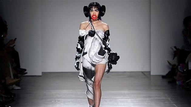 A prestigious New York fashion college apologized on Wednesday after a catwalk featuring models wearing large prosthetic red lips, ears and bushy eyebrows was branded racist.(Instagram)