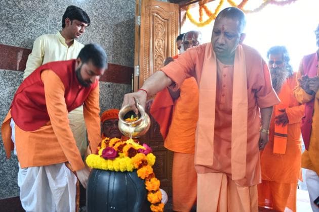 Chief minister Yogi Adityanath offering prayers at a temple in Gorakhpur on Thursday.(HT)