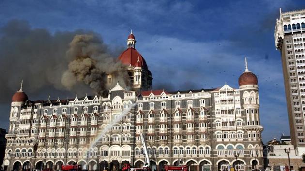 Fire official fighting fire at Taj hotel after the terrorist attack.(Hemant Padalkar/Hindustan Times)