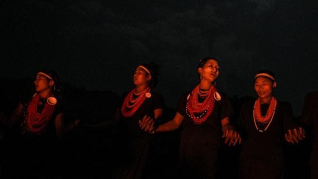 “The song is a prayer to bring success to the hill farms this coming year,” 32-year-old village head Maung Tar told AFP. “We dance in a circle to show we’re united and that nobody can divide us. We don’t let go, whatever happens.” (Ye Aung Thu / AFP)