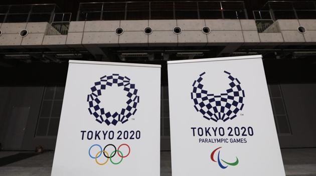 In this Feb. 2, 2020, file photo, two logo for the Tokyo 2020 Olympics and Paralympics, are displayed at a grand opening ceremony (AP) In this Feb. 2, 2020, file photo, two logo for the Tokyo 2020 Olympics and Paralympics, are displayed at a grand opening ceremony (AP)