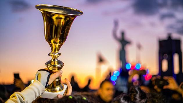 Members of the Amuda women's team carry the winner's cup as they are greeted by locals. After a week-long break the team has resumed training for two hours a day. “Many girls have come to sign up since our victory,” she said. (Delil Souleiman / AFP)