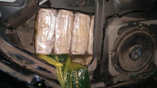 The tablets were hidden inside the front and rear door panels of the vehicle. More than eight kilos of drugs were hidden in the packets.(CREDIT: KOLKATA POLICE.)