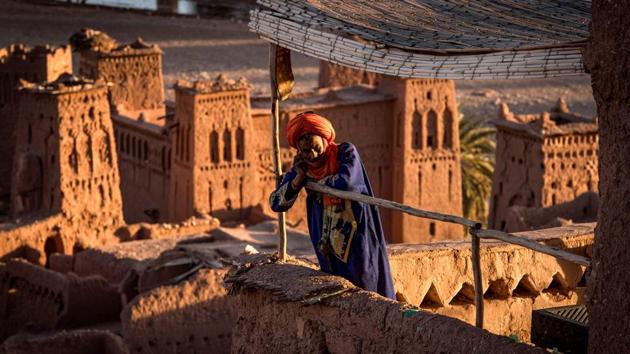 A man stands atop the Kasbah (ancient fortress) of Ait-Ben-Haddou, where scenes depicting the fictional city of Yunkai from the HBO television series “Game of Thrones” were filmed, northwest of the city of Ouarzazate south of Morocco's High Atlas mountains. (Fadel Senna / AFP)