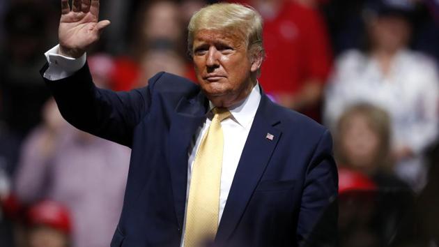 President Donald Trump waves at a campaign rally Thursday, Feb. 20, 2020, in Colorado Springs, Colo. The US president is on a state visit to India on Feb 24-25.(AP)