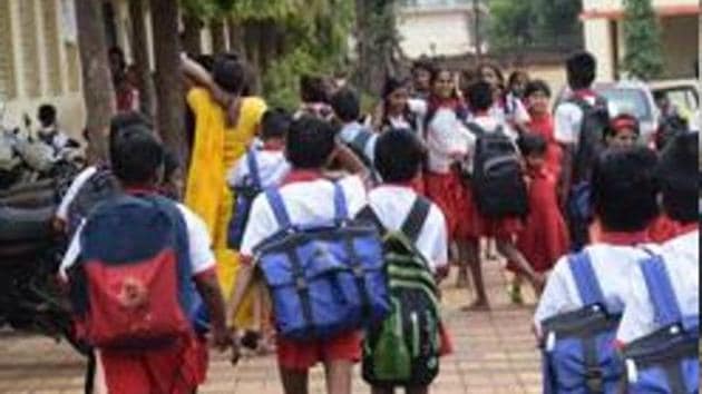 Student With heavy school bag(HT File)