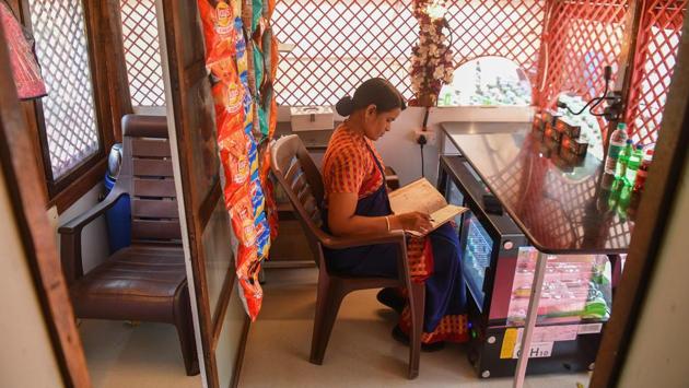 An attendant takes stock of supplies. Manisha Adhav, 40, who operates one of the toilets, told AFP she felt “proud working here as we are doing something for women”. “Women bless me ... as they come here from far away areas as well because there aren’t enough public washrooms around.” (Indranil Mukherjee / AFP) 