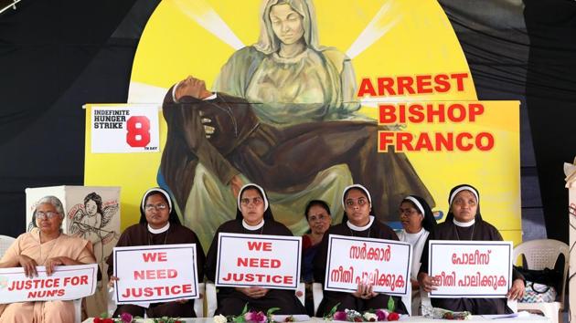 Nuns hold placards during a protest demanding justice after an alleged sexual assault of a nun by a bishop.(HT File Photo)