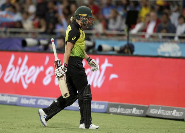 Australia's Meg Lanning walks off after she wast caught behind against India during the first game of the Women's T20 Cricket World Cup in Sydney. (AP)
