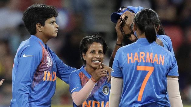India's Poonam Yadav, center, is congratulated by teammates after taking the wicket of Australia's Rachael Haynes during the first game of the Women's T20 Cricket World Cup in Sydney. (AP)