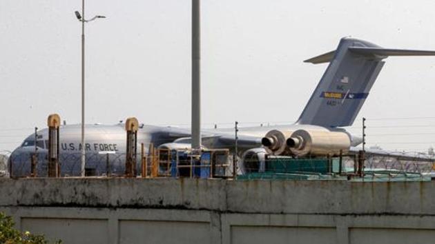 A US cargo plane, carrying vehicles and other supplies, was seen parked at the Sardar Vallabhbhai Patel International Airport earlier this week.(PTI Photo)