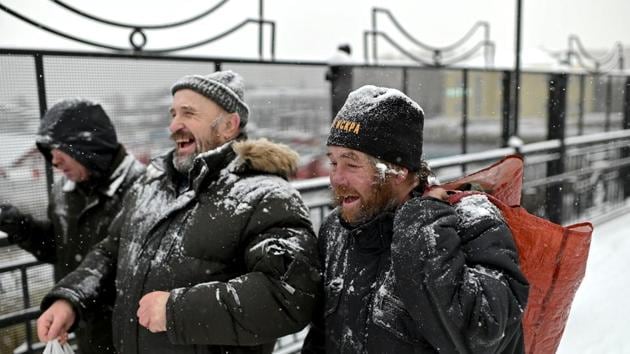 Alexei Vergunov (R), searches for rubbish that could be recycled in exchange for payment at a recycling centre. The 46-year-old has lived like this for more than 11 years. “You sleep at night with your eyes closed but your ears open,” he told Reuters. (REUTERS)